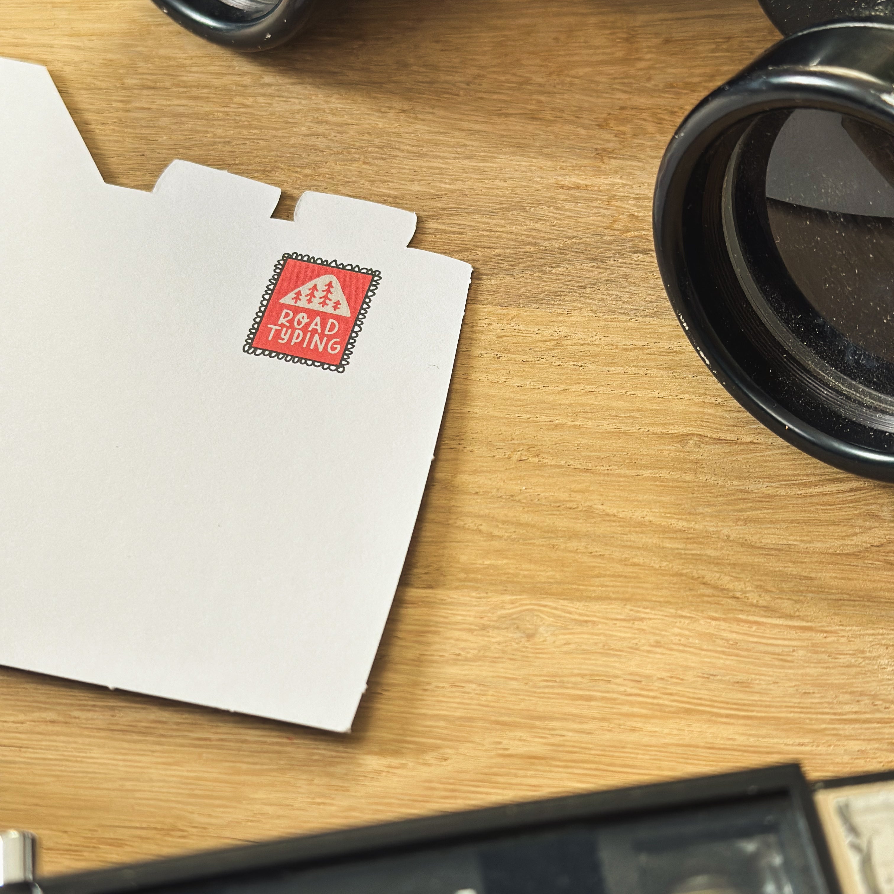 Postcard punched camera